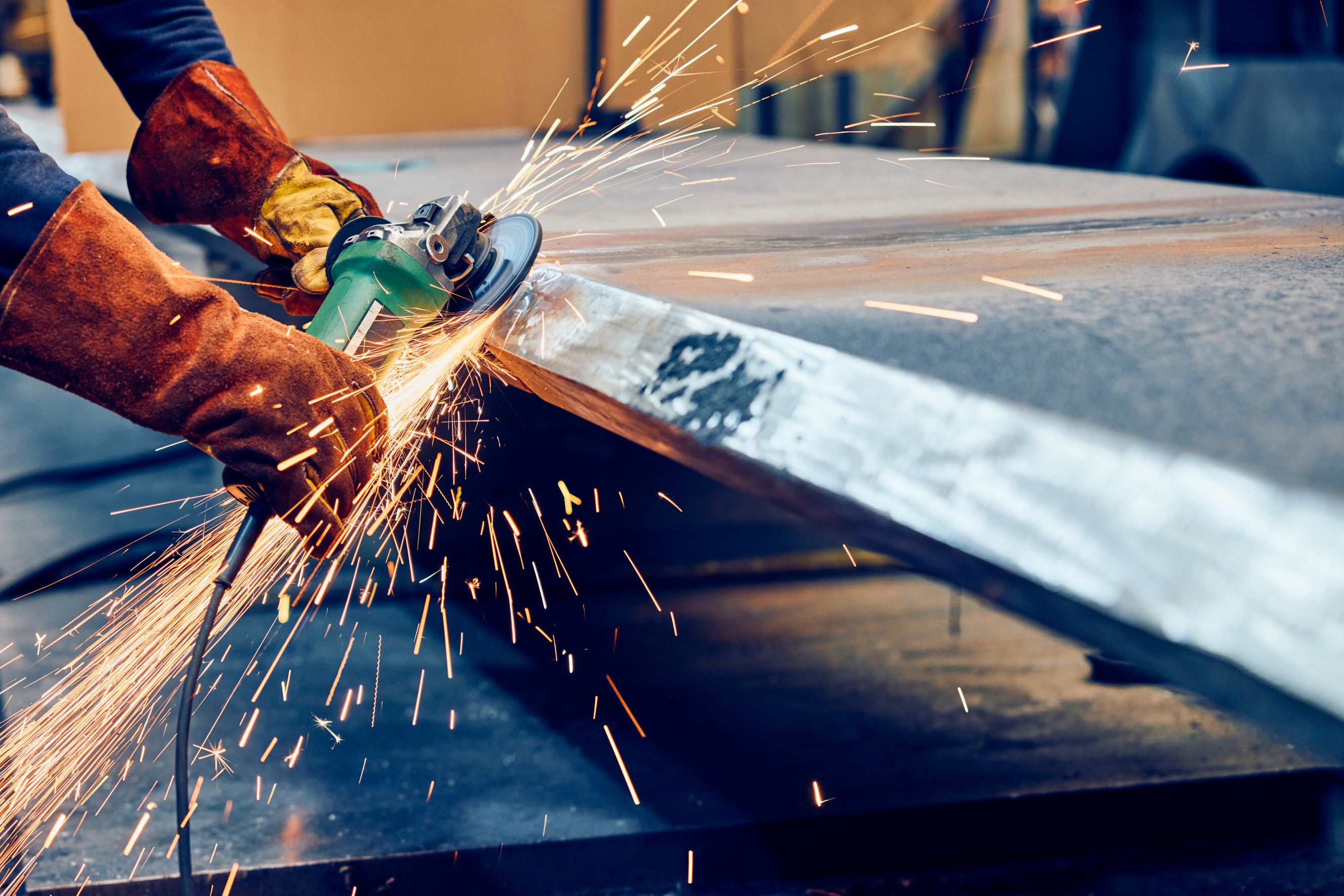 Tasker performing a Metal Fabrication job.