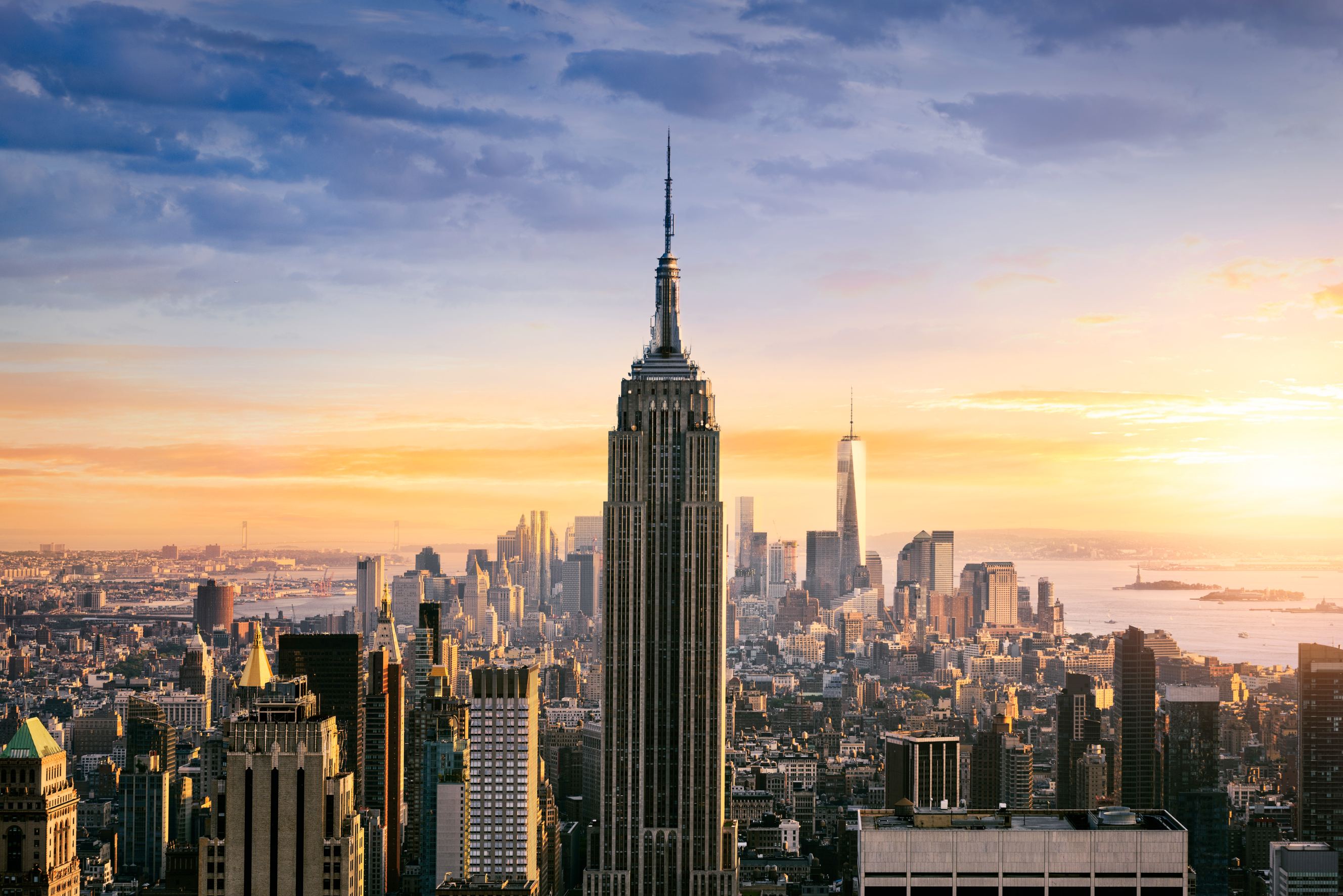 New York City skyline with urban skyscrapers at sunset.